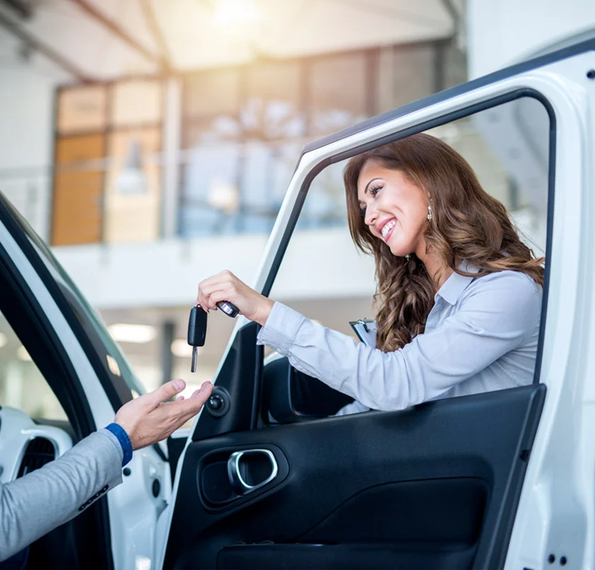 Customer receiving car keys